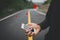 Man hand using smartphone with gps navigator map icon on blur street background