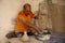 Man handcrafting pottery in its traditional way