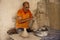 Man handcrafting pottery in its traditional way