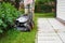 Man handling lawn with lawnmower