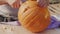 Man hands carving pumpkin for Halloween jack-o`-lantern