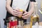 Man hands crushes a lemon in a shaker, preparing a cocktail, men