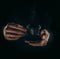 Man hands with cup of coffe close up image