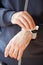 Man hands disinfecting smart watch, eliminating germs coronavirus bacteria