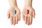 Man hands giving two big pills. Blue and red. Make your selection. Health or ill. Choose your side