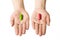 Man hands giving two big pills. Green and red. Make your selection. healthy lifestyle or bad habits. Choose your side