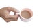 Man hands holding a pink cup of coffee