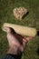 Man hands playing at finnish family outdoor throwing game called Molkky