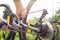 Man hands repairing the bike by repair key, doing maintenance of his bicycle