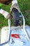 Man hands repairing wheelbarrow