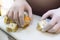 Man hands sorting ham roll ups, finger food buffet meal concept