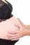 Man hands touching the belly of his pregnant woman listening to the baby moving