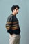 Man handsome sweater trendy face copyspace smile one portrait hipster fashion
