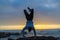 Man Handstand Ocean Rocks Silhouetted