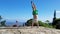 Man Handstanding on top mountain