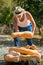 Man harvests big pumpkin from patch.