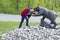 Man Has His Head in the Jaw of a Bear Statue