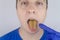The man has a yellow tongue. Painful yellow coating on the mucous membrane of the tongue. Diseases of the gastrointestinal tract,
