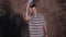 Man with hat happy portrait smiling on brick background