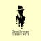 man in a hat and wearing a gentleman suit logo icon