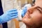 Man Having Botox Treatment At Beauty Clinic