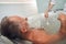 Man having hydromassage procedure at wellness spa center