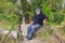 Man having rest at the foot-bridge