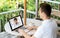 Man having video chat with doctor on laptop