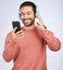 Man, headphones and smartphone for music in studio, white background and podcast app. Happy asian male model, cellphone