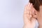 Man hearing loss or hard of hearing and cupping his hand behind his ear isolate grey background, Deaf concept