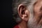 Man hearing problem closeup view. Generate Ai