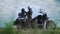 Man help his girl with helmet of motorcycle, couple preparing to ride