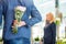 Man Hides Bouquet From Woman In Flower Shop