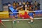 Man are high blocking the ball on the net in game of Kick Volleyball,sepak takraw