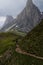 Man hikes in the Dolomites - Passo Giau