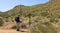 A Man Hikes the Go John Trail, Arizona