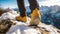 Man hikes snowy mountains in sturdy boots