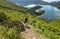 Man Hiking down to Lagoa do Fogo In Sao Miguel Azores