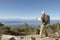 Man With Hiking Pole On Coastal Track