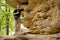 Man hiking sandstone rocks