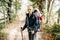 Man hiking with sleepy toddler child in backpack in mountain