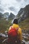 Man hiking solo enjoying mountains landscape travel in Norway outdoor adventure