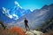 Man hiking on a stone view in the himalayas