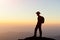 Man hiking success silhouette in mountains