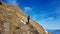 Man hiking in the Swiss Alps. Alvier with view on Rhine valley. Saint Gallen, Switzerland.