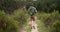 Man, hiking and walking in nature for travel adventure, wellness and fitness or journey in a backpack. Back of hiker or