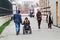 man with his beloved disabled girlfriend on a wheelchair is traveling around the city of Vienna