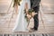 Man and his bride standing on the wedding ceremony