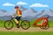 Man and his children traveling cycling together outdoor. Moutain Landscpape Background