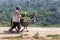 A man with his donkey carrying produce on the outskirts of Meknes in Morocco.